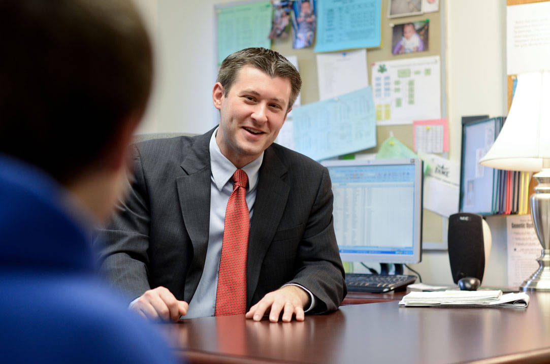 Graduate in his school administrator office
