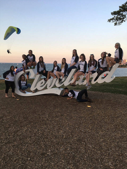 Students at Cleveland sign at Edgewater Park Beach
