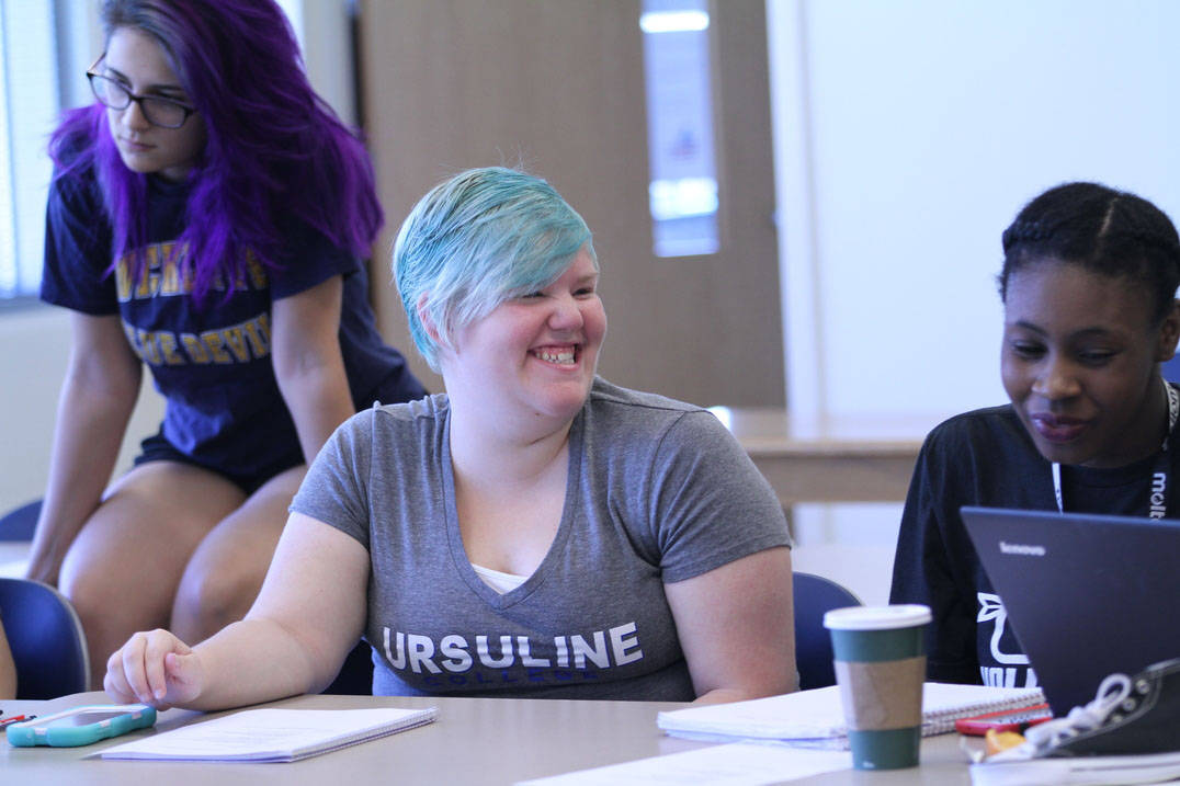 Student smiles during class