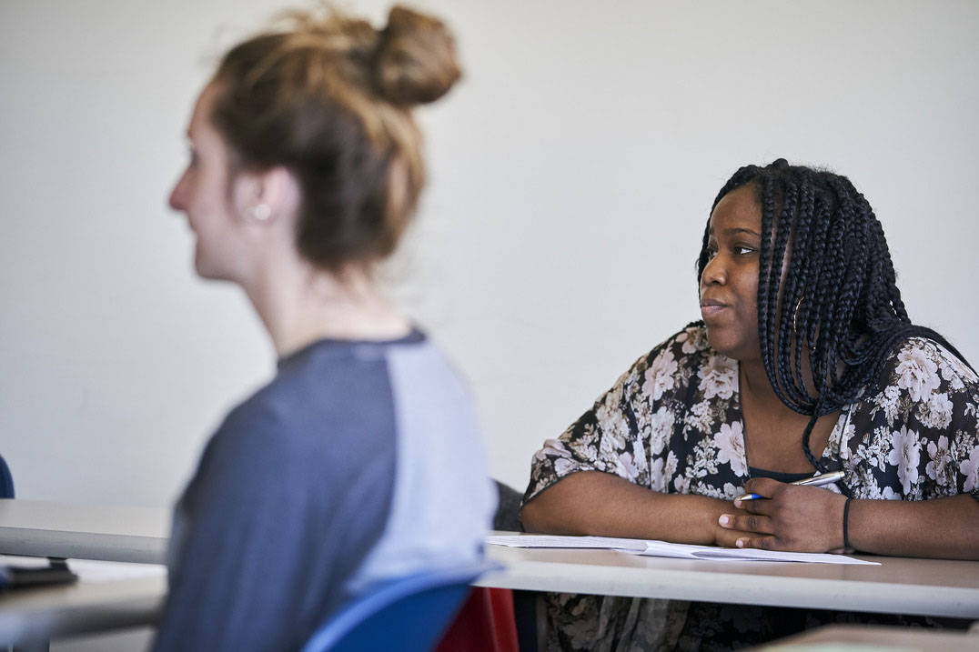 BSW degree students listen to professor