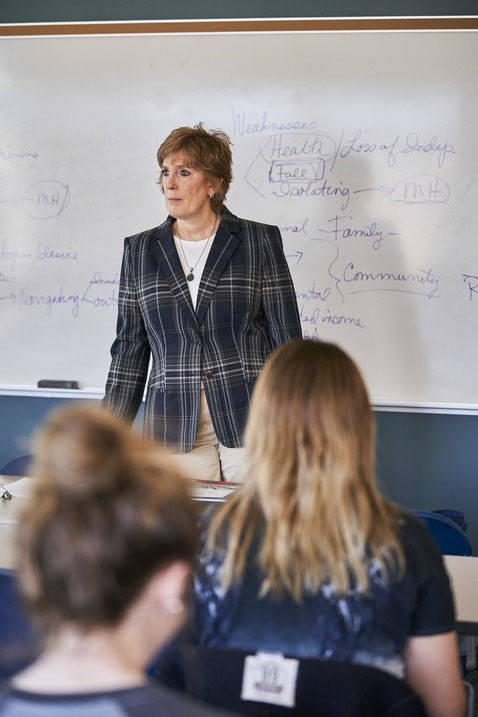 BSW program professor listens to student