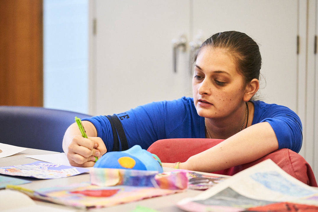 Art therapy program student writing critique