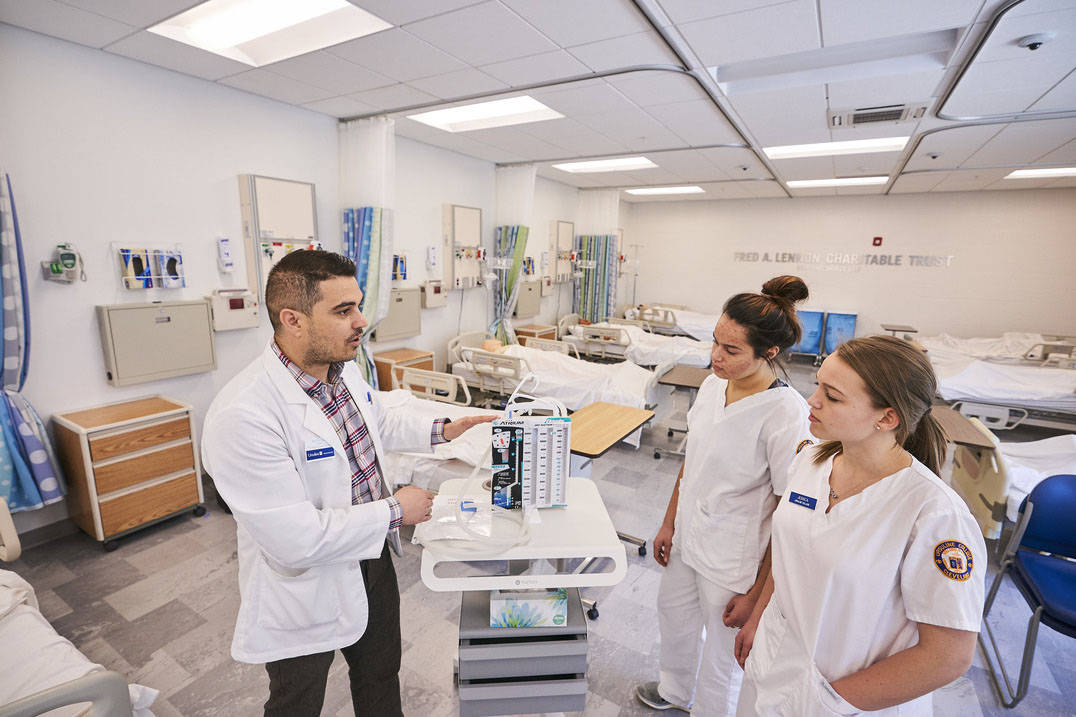 Professor explains breathing machine to accelerated nursing students in Ohio