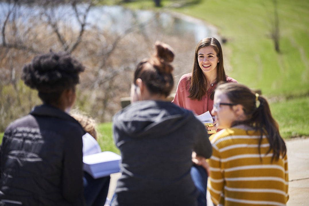 Professor discusses reading with students