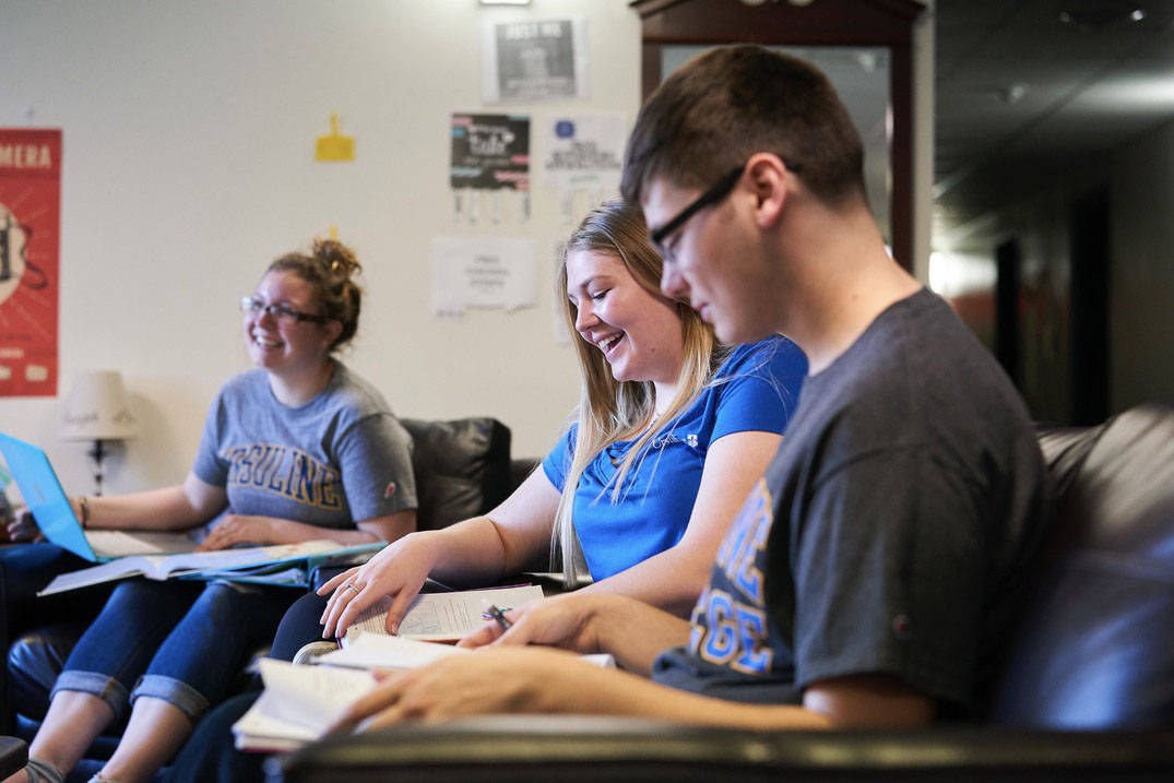 A group of friends study in the residence halls at Ursuline College