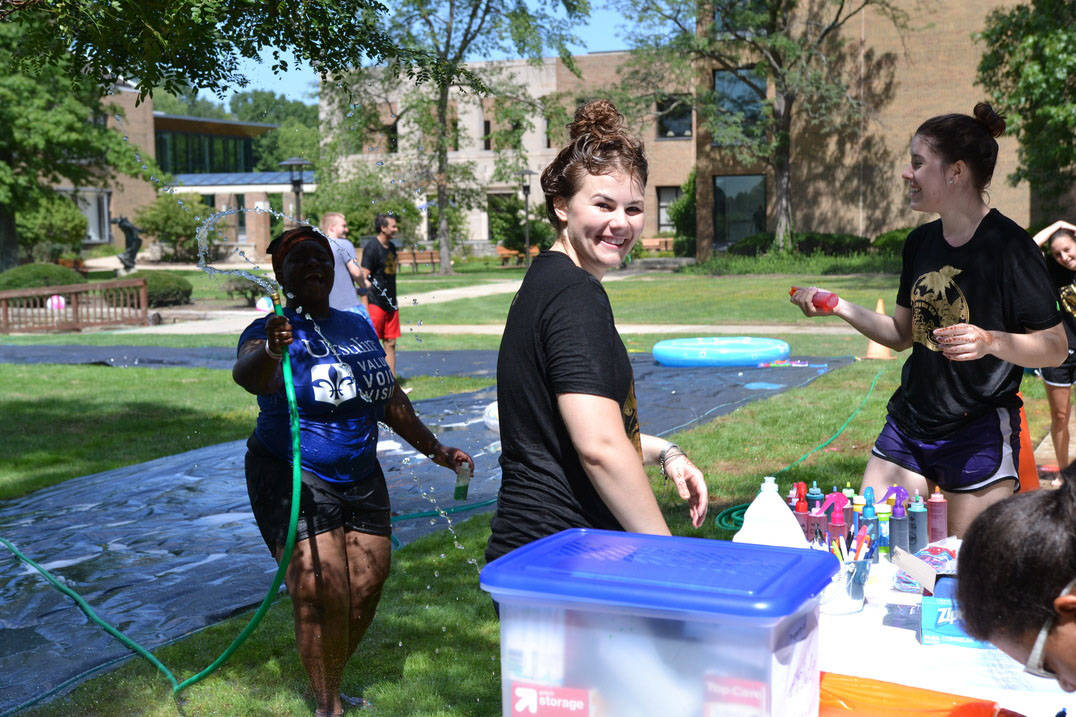 Ursuline Students have a water fight