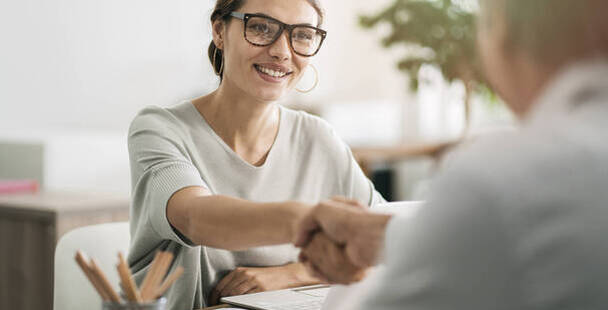 Image of Financial planner with her client