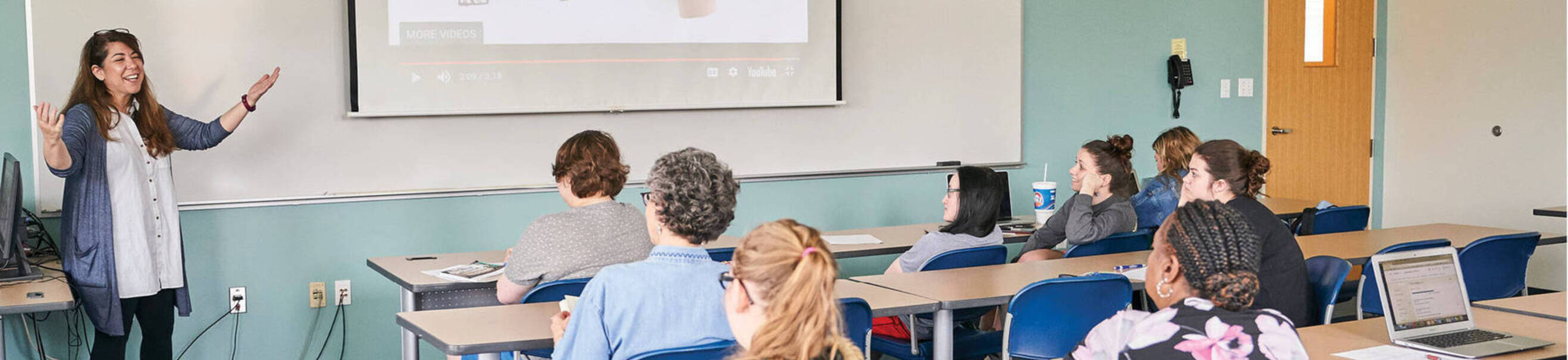 Ursuline faculty member Dr. Gina Messina teaches a classroom of students
