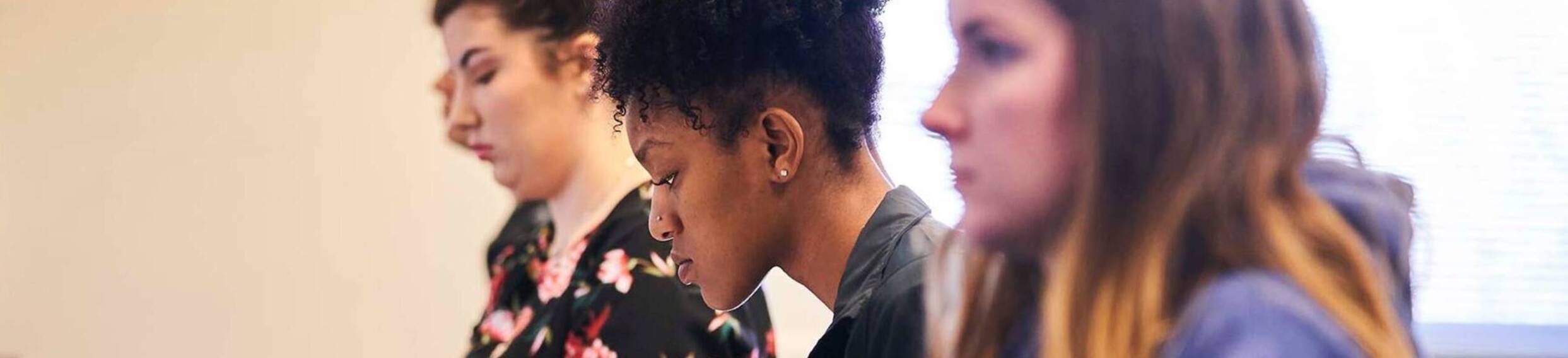 Ursuline college student looking at computer screen6