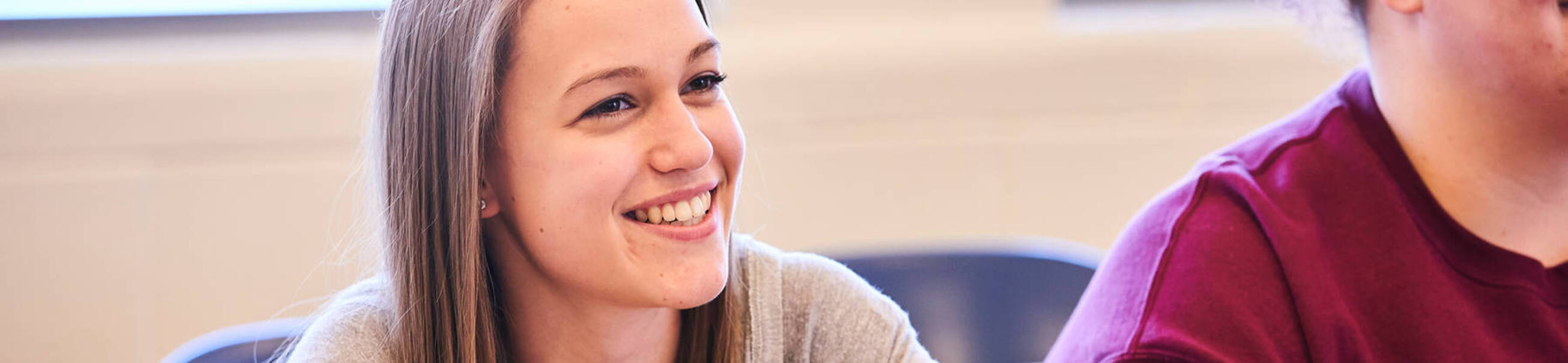 Ursuline college student smiling in class