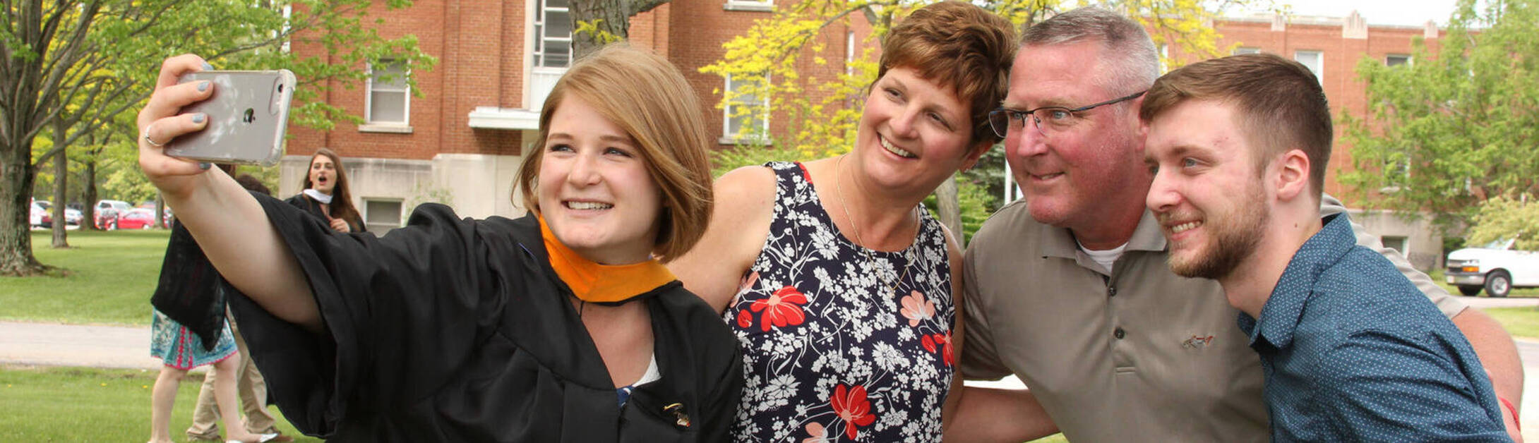 Ursuline college students graduation day with parents